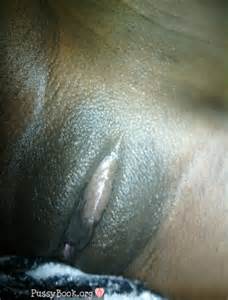 Shiny Ebony Pussy Shaved Up Close Nude Female Photo